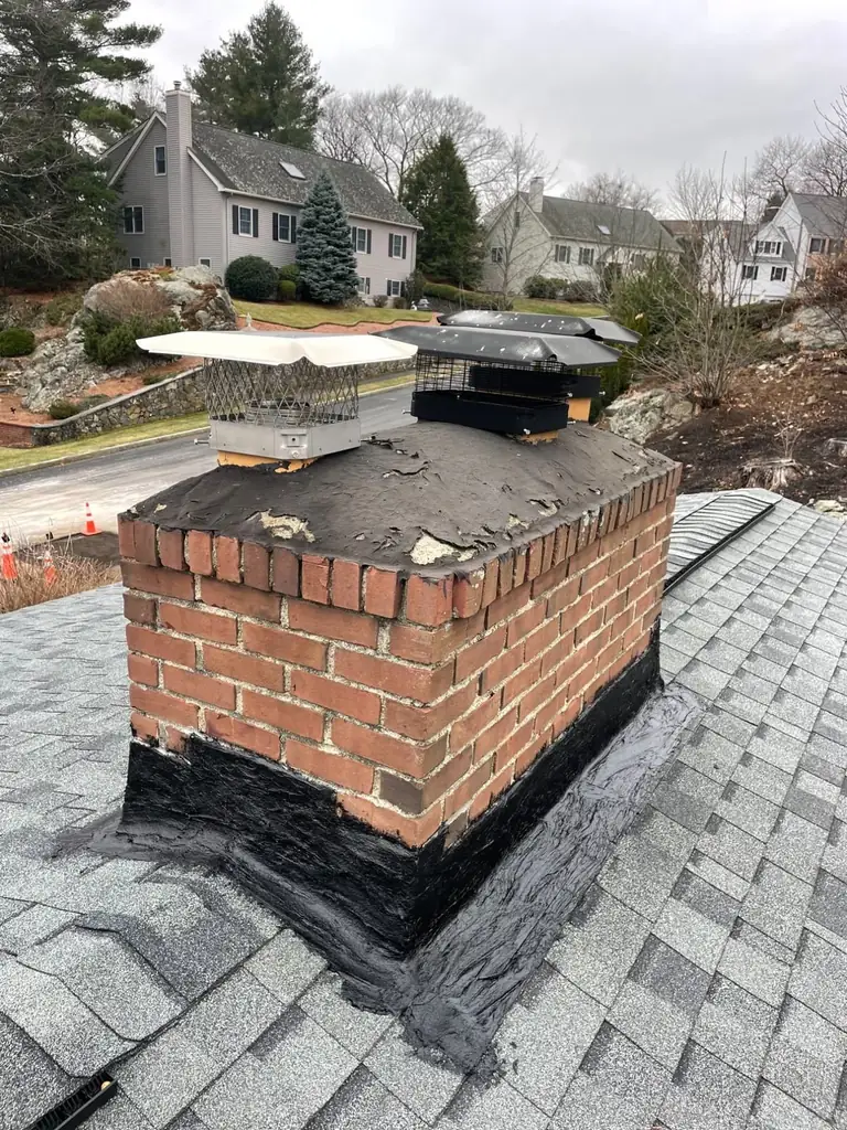 Chimney flashing and cap repair for a Greater Boston home