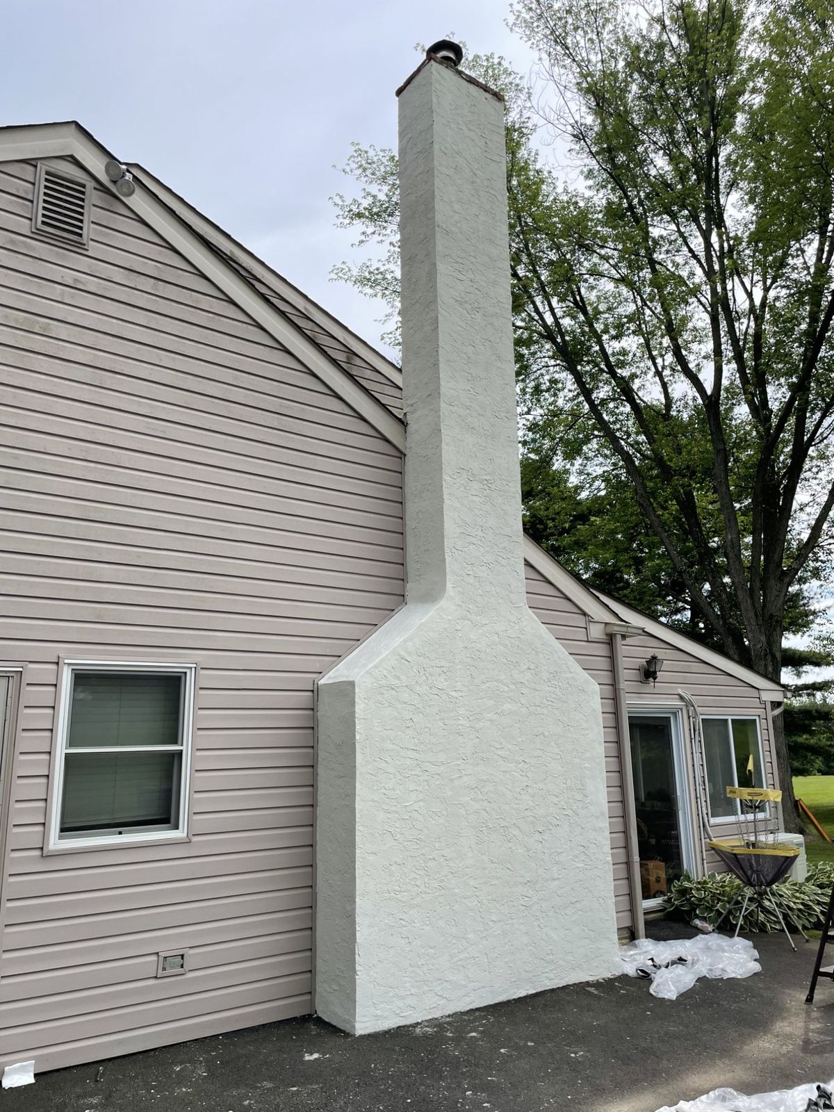 Completed chimney waterproofing and stucco repair in Greater Boston