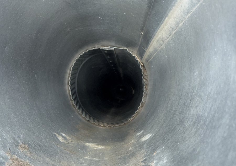 Clean dryer vent duct after service