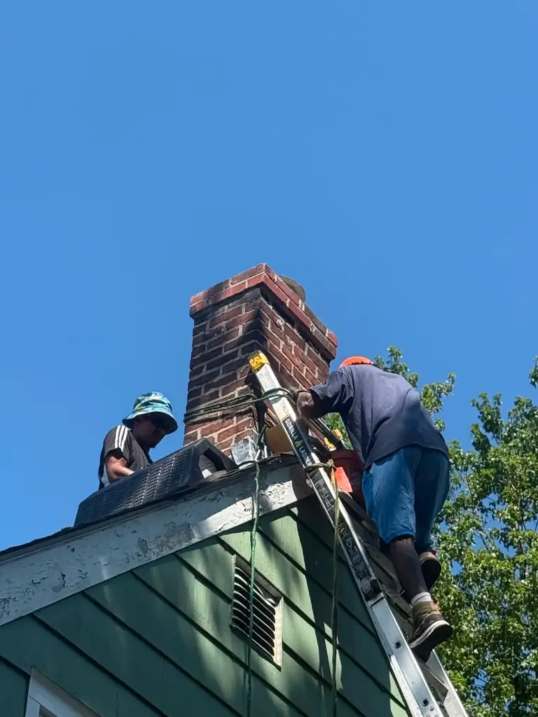 Chimney flashing repair team working in Braintree MA