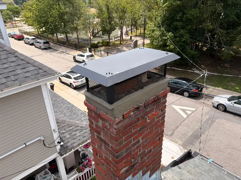 Custom chimney cap installed in Boston MA