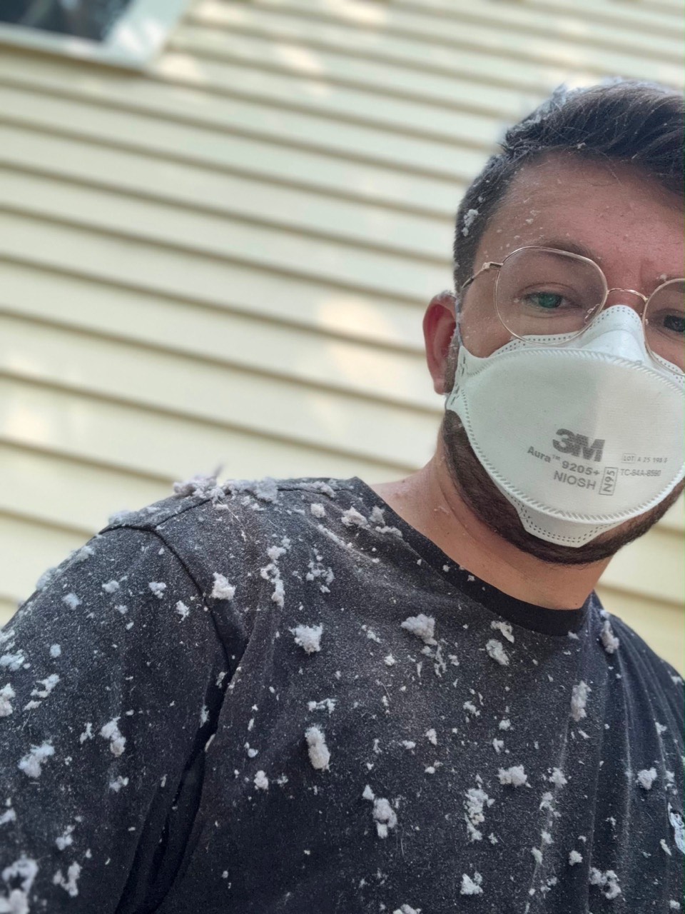 Technician after removing lint from dryer vent in Lexington MA