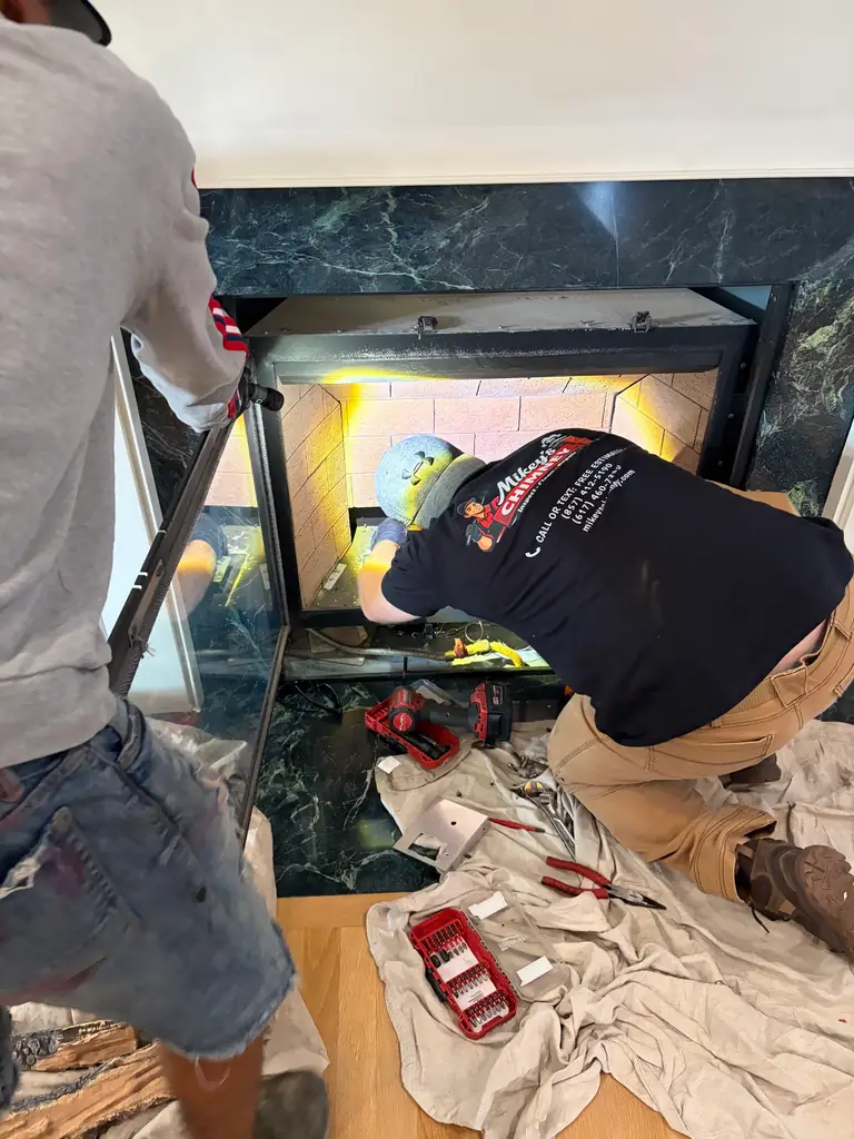Gas fireplace service team working in Londonderry NH